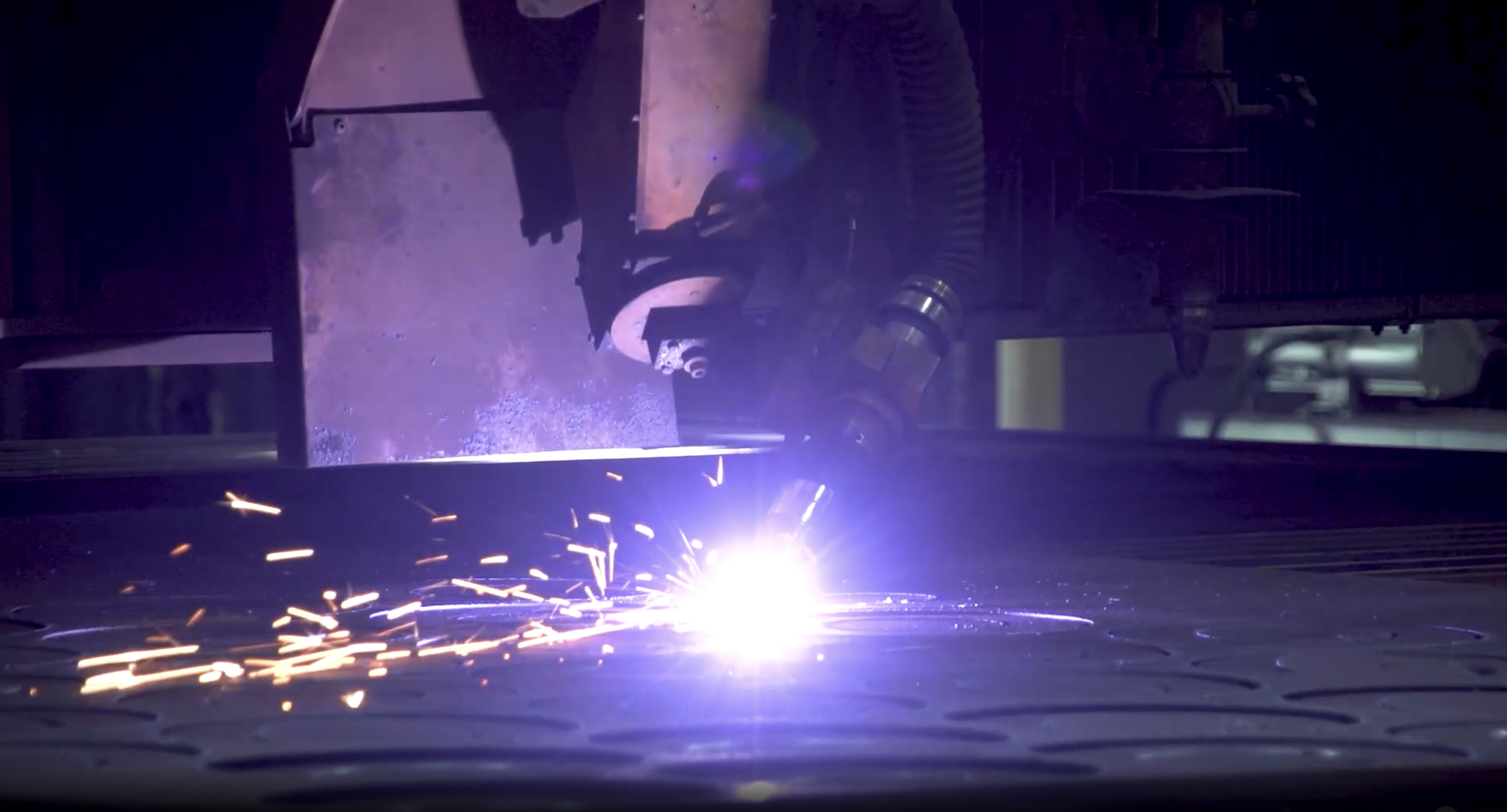 CNC metal cutting on a manufacturing shop floor